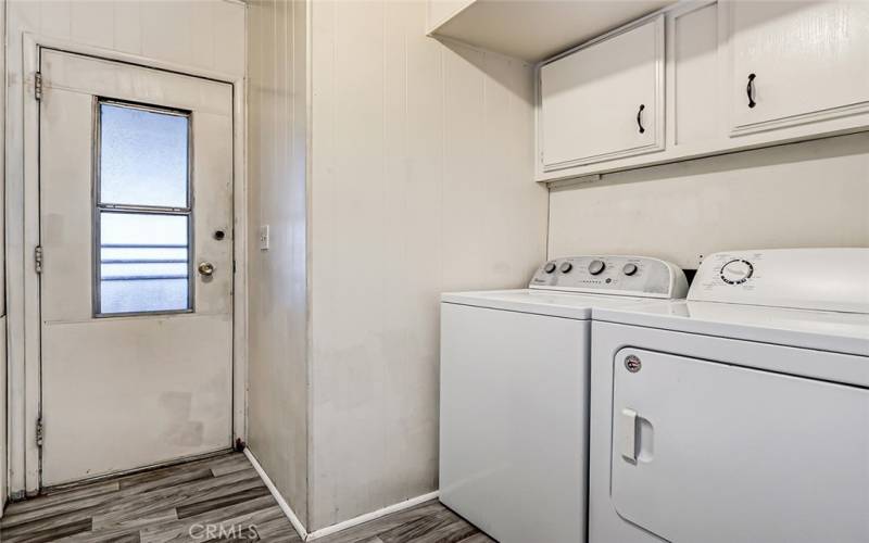 backdoor exit to the carport and the laundry area - washer and dryer included