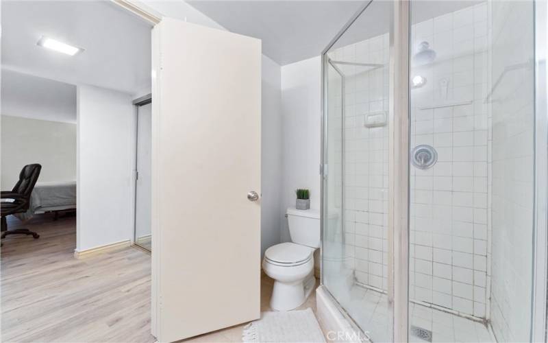 First primary suite with standing shower.