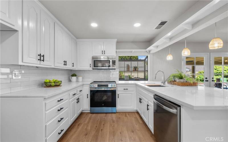 Kitchen with single basin sink.