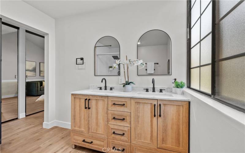 Primary bathroom with new dual vanities.