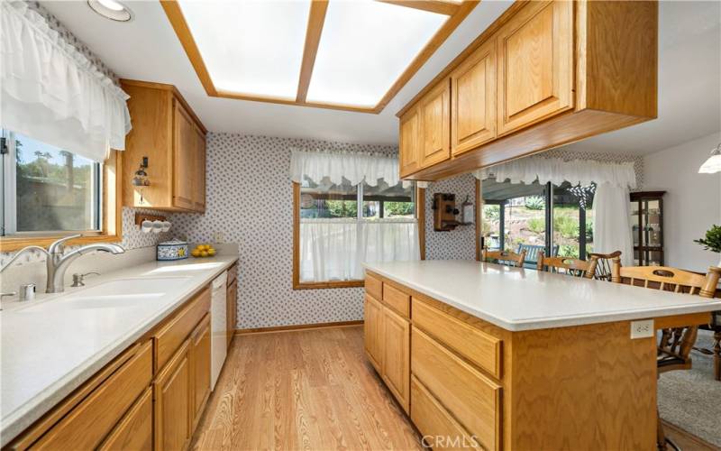 Kitchen opens to dining area and family room