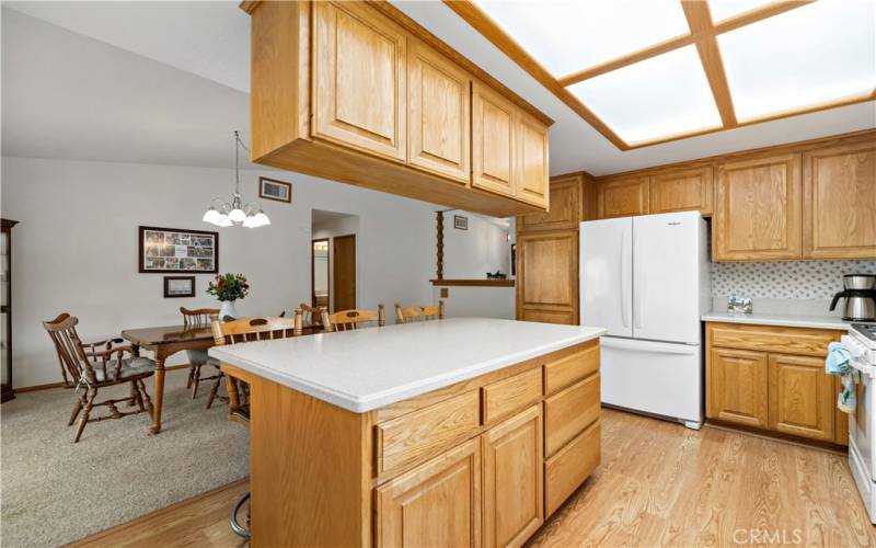 Kitchen opens to dining area and family room