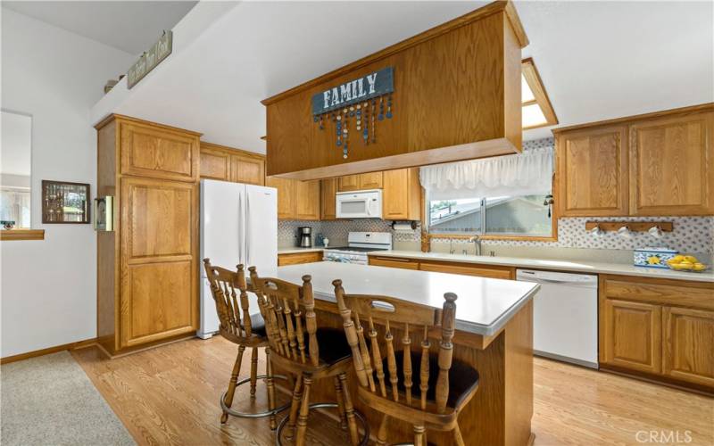 Kitchen opens to dining area and family room