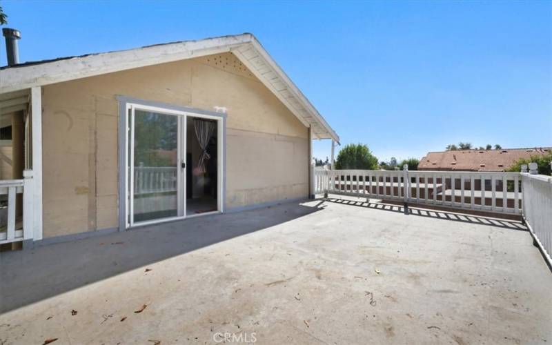 The dual paned sliding glass door off of the primary bedroom makes it easy access to the balcony.