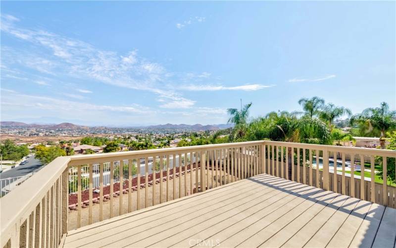 Balcony off primary bedroom with panoramic view