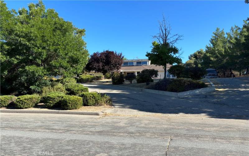 Main Driveway + RV parking to the right.