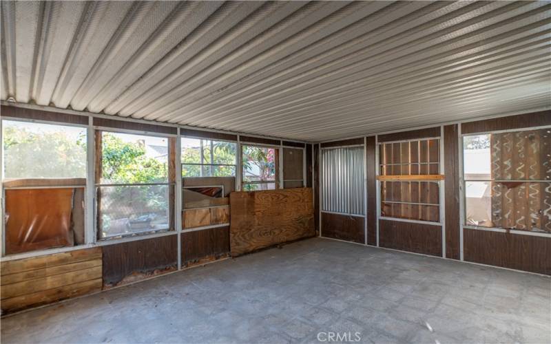 Enclosed patio behind the bonus room.