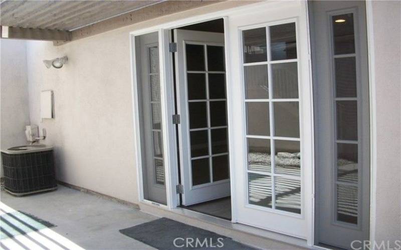 Living room to patio to garage