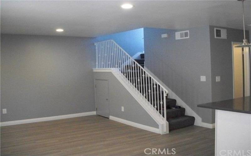 Living Room leading to upstairs bedrooms and bathroom

Stairs are carpeted