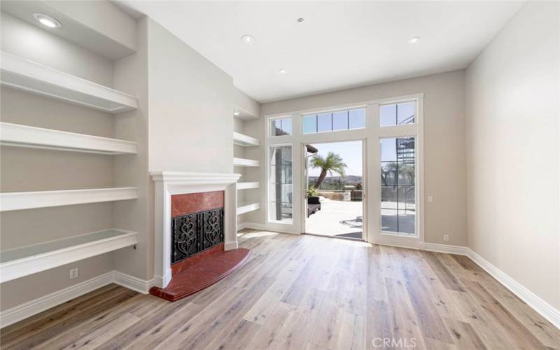 Formal Family room with Double doors opening to pool deck