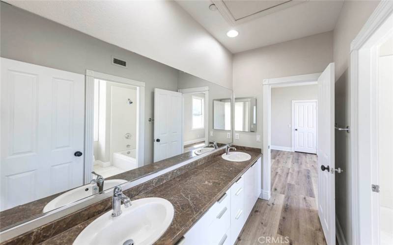 twin Vanities at shared upstairs bathroom