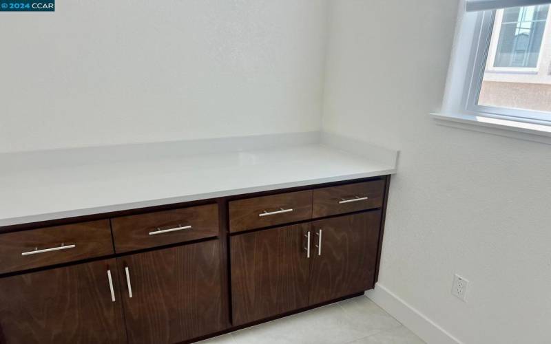 Upstairs Laundry room with Cabinet