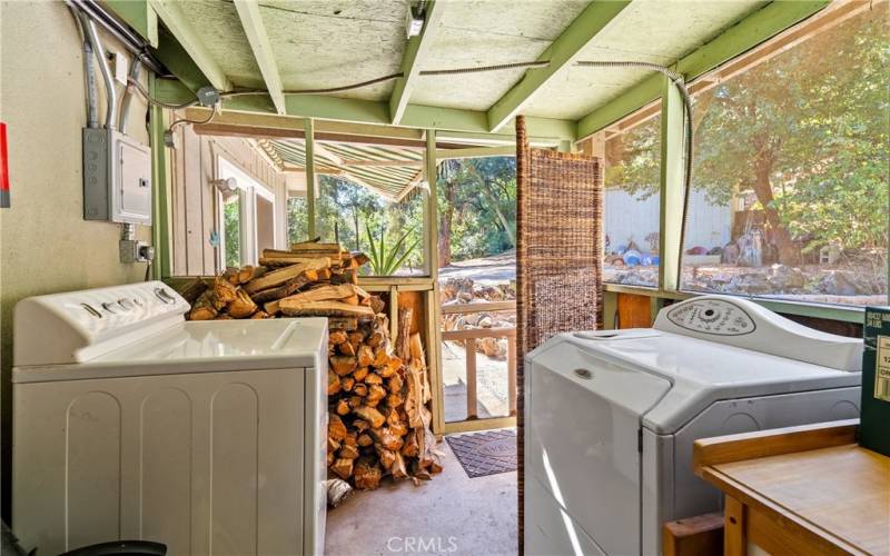 The laundry is found in an enclosed patio at the front of the home.