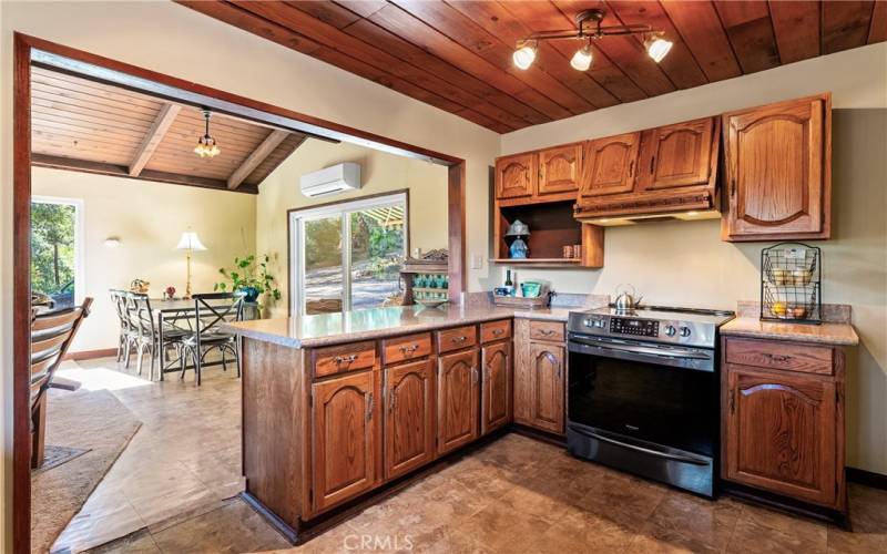 Nicely updated kitchen with abundant cabinetry and pull out shelves.