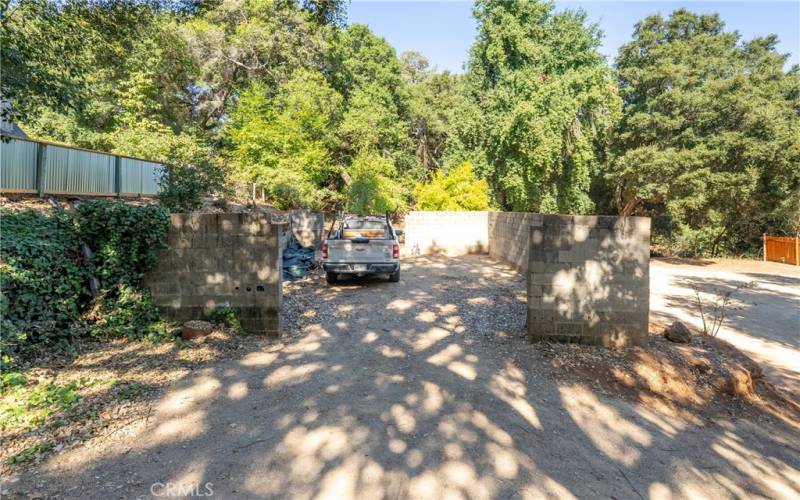 Block walls reveal the beginnings of what could be a garage or workshop.