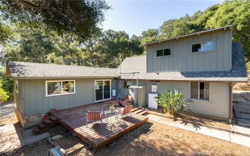 The inviting back patio invites you to sit down and relax!