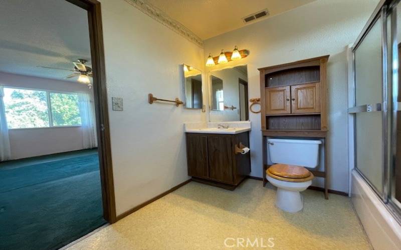 Master Bathroom with tub and shower