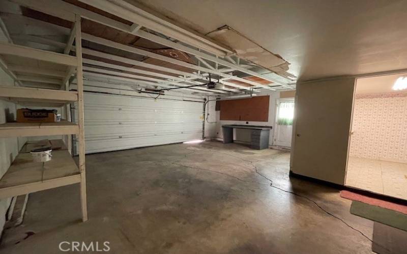 Inside garage with false wall for laundry area.