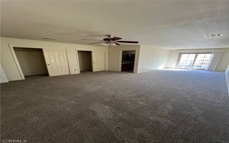 Primary Bedroom with sliding door to the rear deck