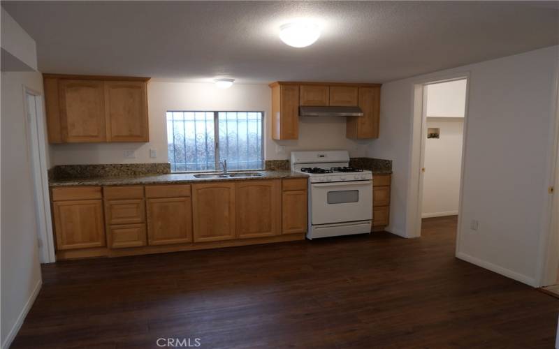 Kitchen #2 w/entrance to laundry room #2 on right