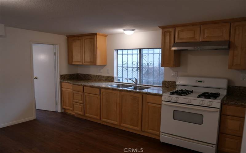 Kitchen #2 w/entrance to bonus room #1 on left