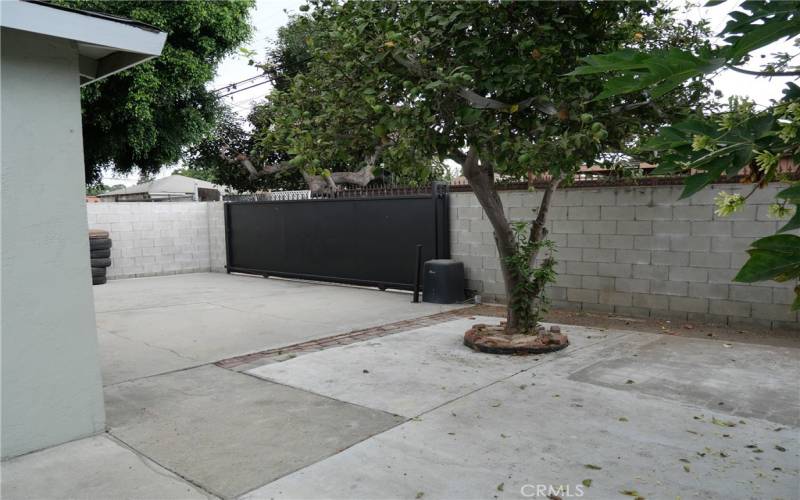 Rear driveway and yard off alley with gate access