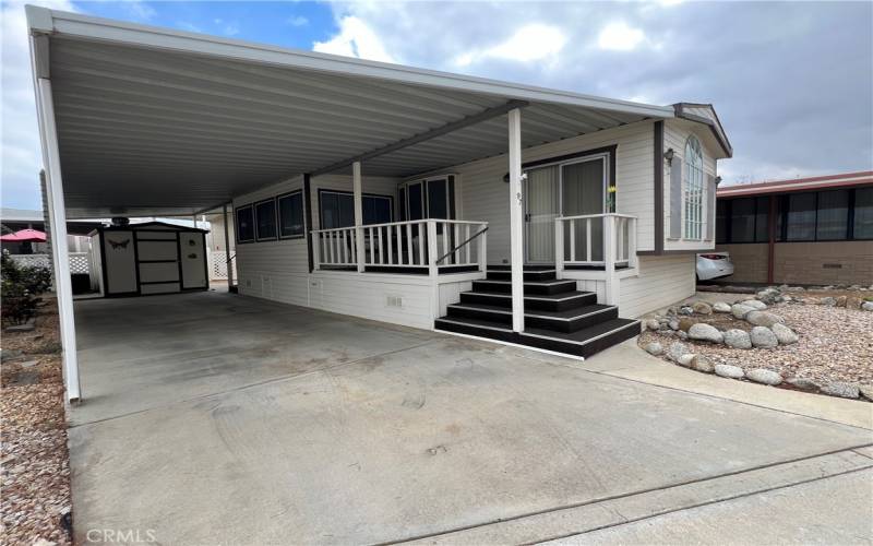 Covered carport and side awning for privacy