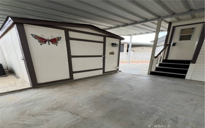 Shed includes a washer and dryer.