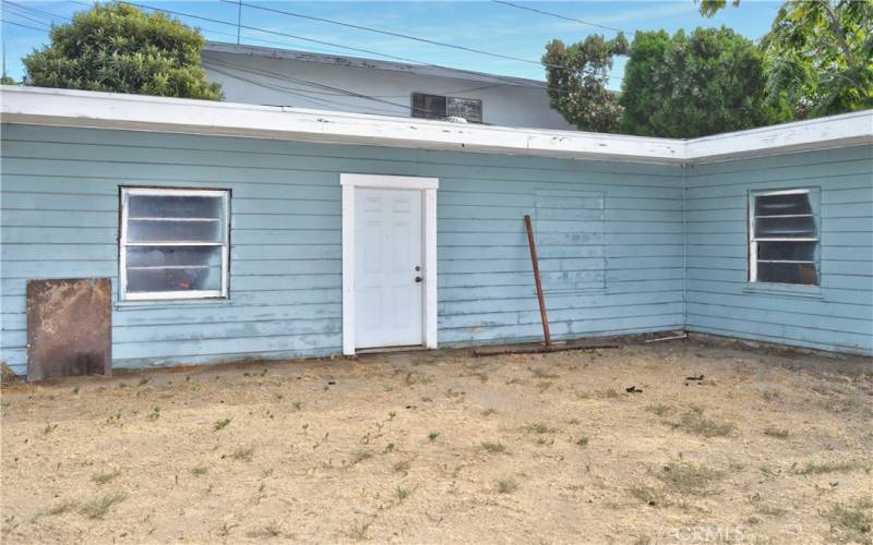 Side door to the 2nd (larger) garage.