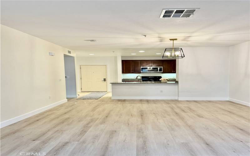 Looking toward the dining room and kitchen from the living room