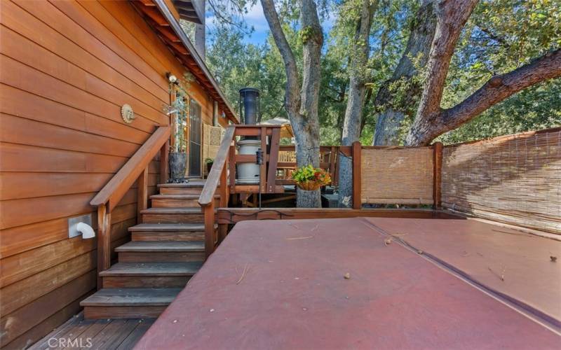 STEPS DOWN FROM MAIN PATIO IS THE BEAUTIFUL, WARM, COZY SEE EVERY STAR SPA DECK!