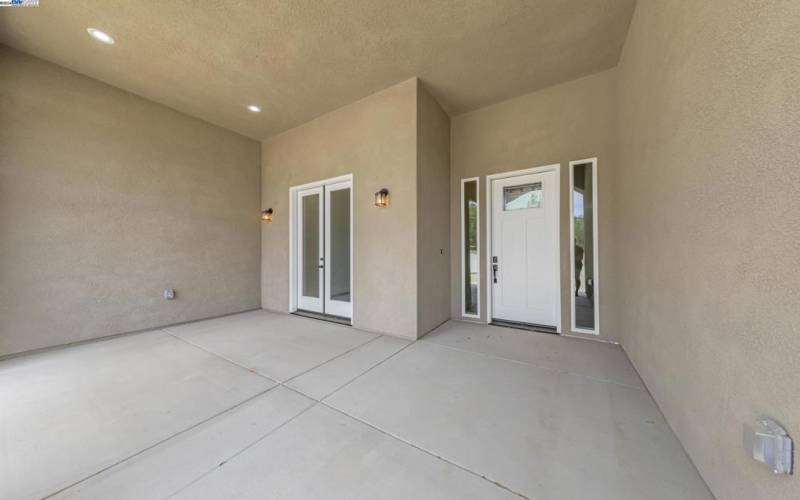 Front patio with french doors to Dining Area