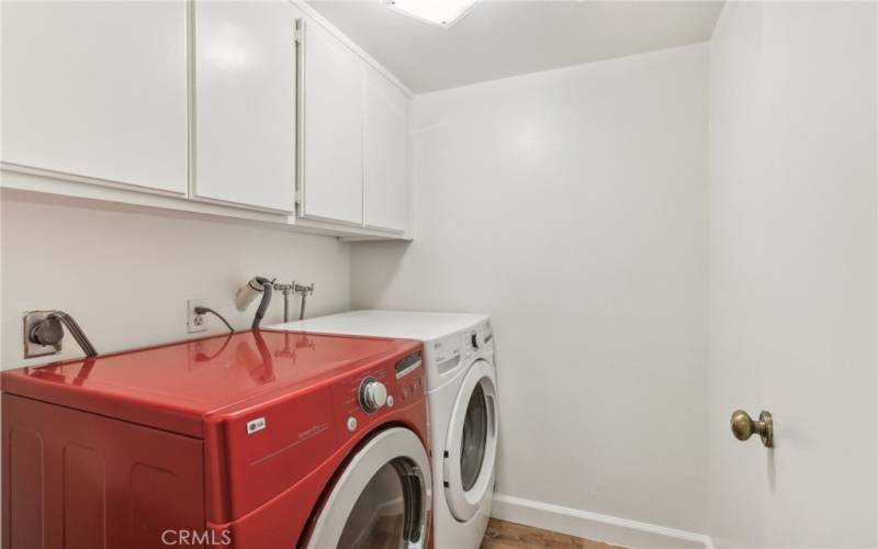 Private laundry room in unit