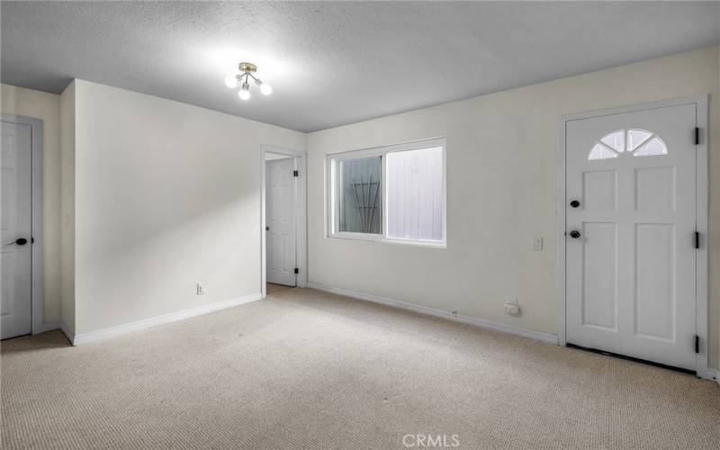 Third bedroom bonus room with own bath, door leads to private side yard.