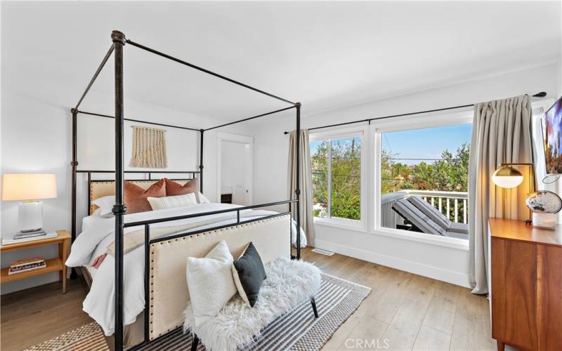 Upstairs secondary bedroom with peek a boo ocean views