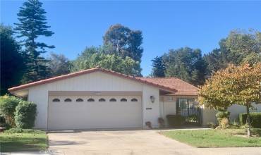 Welcome to 5034 Avenida Del Sol - a lovely upgraded VILLA TERRAZA residence in the coveted Gate 11 neighborhood in the Laguna Woods senior community. Note the attractive curb appeal with landscaping maintained by the Mutual. In addition to the two-car garage, additional parking is available in the driveway. The garage contains washer-dryer hookups and multiple storage cabinets.