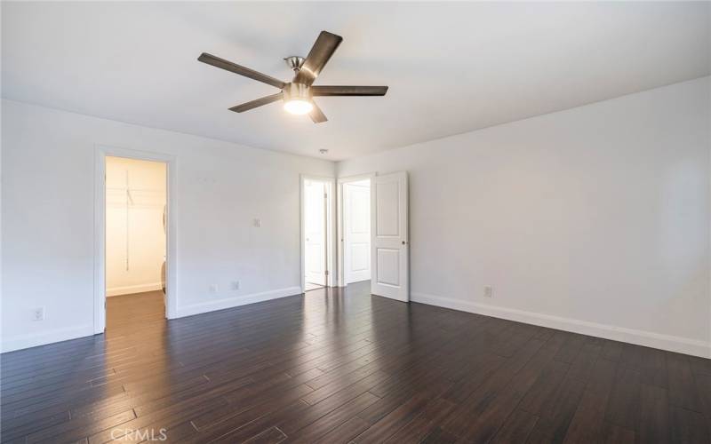 Each bedroom has a window and ceiling fan