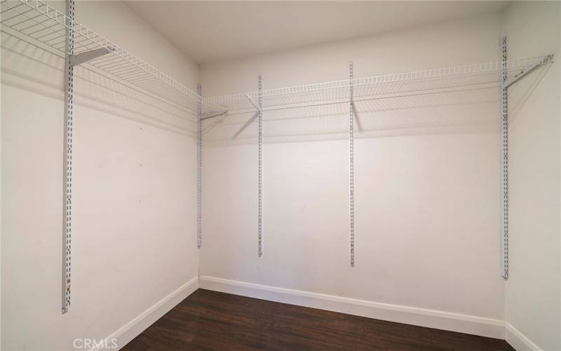 Large walk in closet for one of the bedrooms.