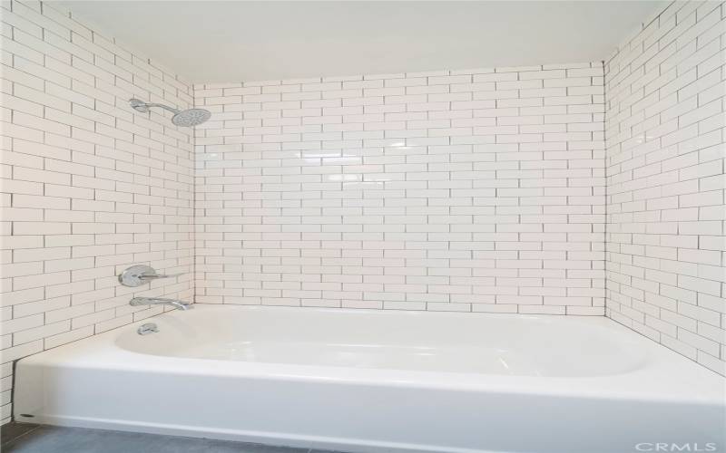 Comfortable tub in one of the bedrooms.