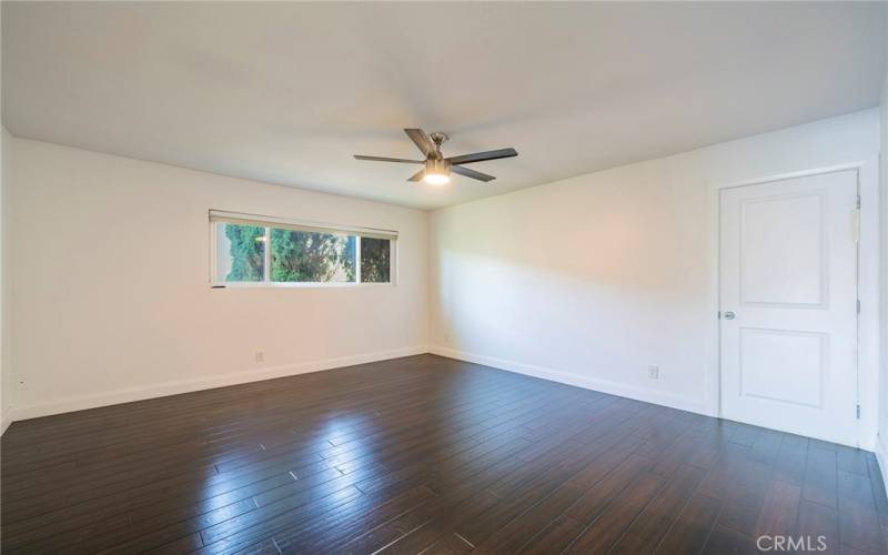 Each bedroom has a window and ceiling fan