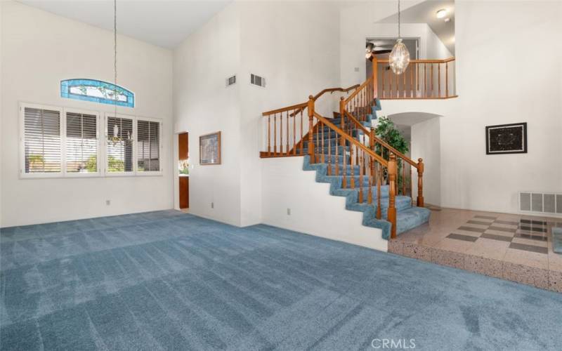 Winding Stairway looking onto the Formal Living and Dining Room