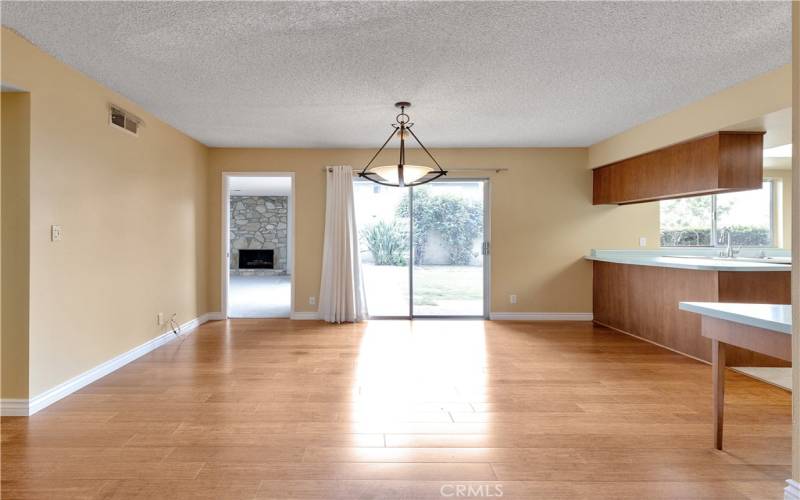 dining open to kitchen and first living room