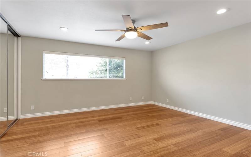 first floor primary with attached bath - one of three bedrooms on first floor