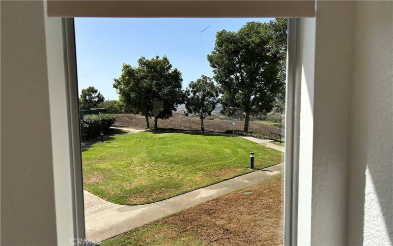 Another view window overlooks the pocket park