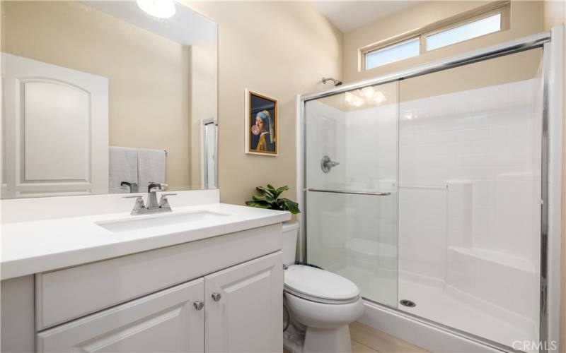 3/4 bath located next to front bedroom and office/den