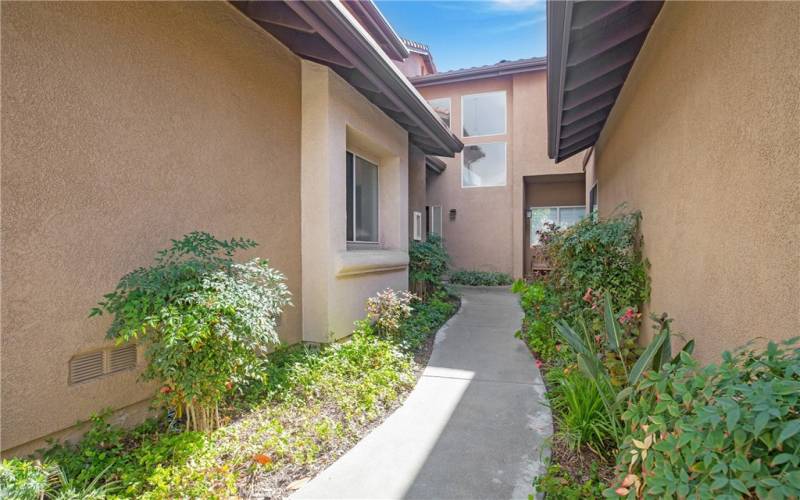 Nicely landscaped walkway to the front door