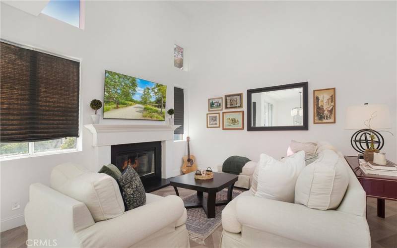 Spacious Living room with soaring 2 story ceilings