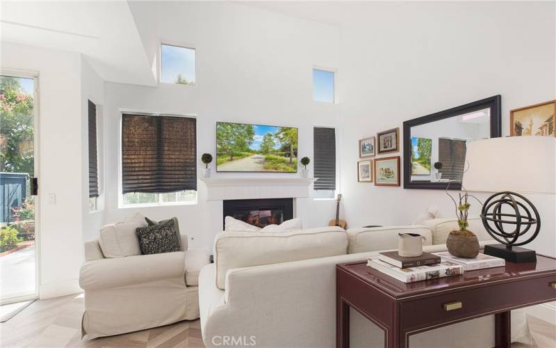 Cozy fireplace with a custom mantle in the