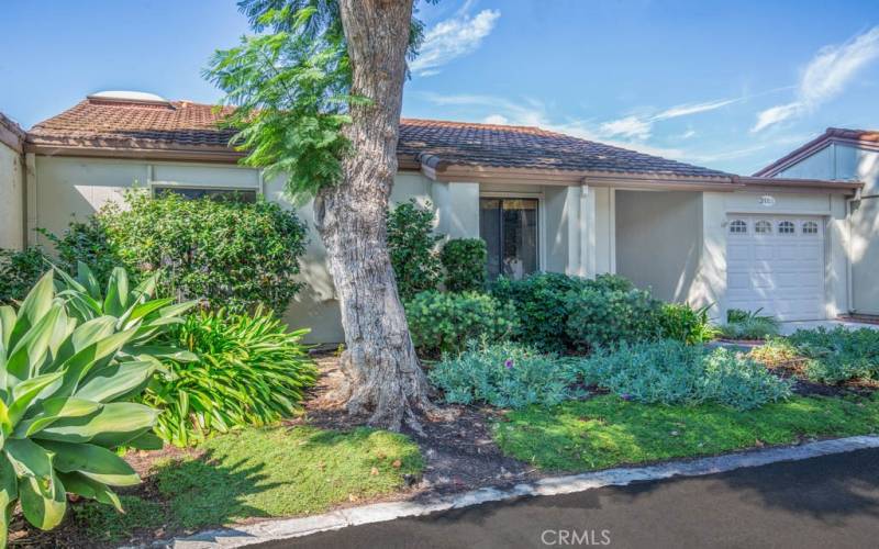 Another view of the front of the residence. Note the lush landscaping. This home has excellent curb appeal!