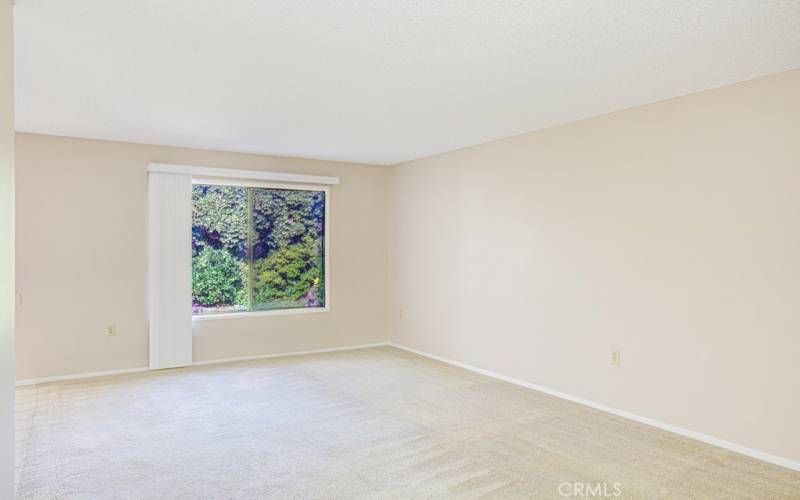 Another view of the living room looking towards the rear of the property.